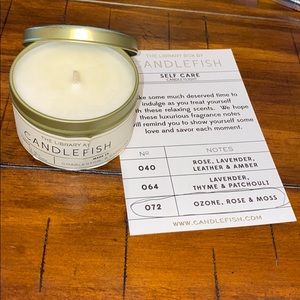 Never burned Candlefish candle Ozone, Rose, & Moss